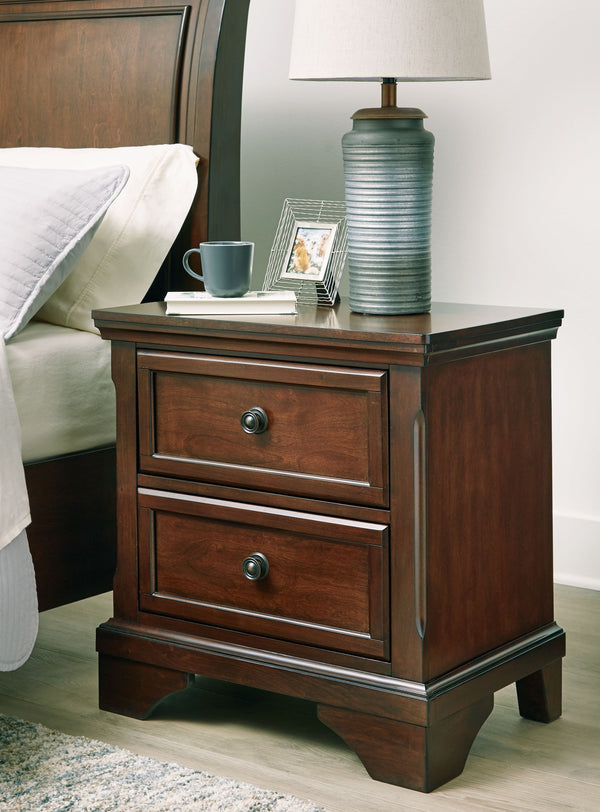  while round metal knobs in a dark bronze tone create a beautiful focal point on two stylishly subtl