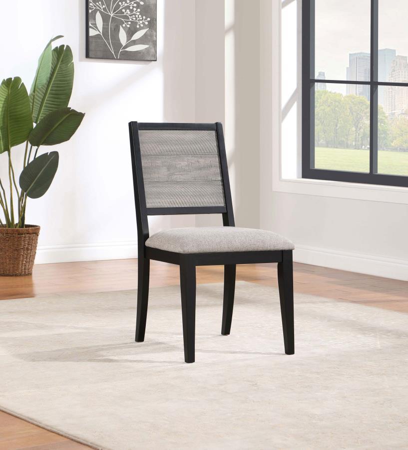 Complete your dining set with these stylish chairs featuring a sleek grey and black two-tone finish. Designed with a sturdy plywood base, they offer durability and stability. The cozy dove grey fabric, crafted from 100% polyester, provides a comfortable s