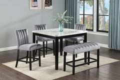 Elevate your dining space with this luxurious and modern counter height dining group, designed to bring elegance and sophistication to every meal. The stunning faux-marble tabletop offers a sleek and polished look, beautifully complemented by the bold, bl
