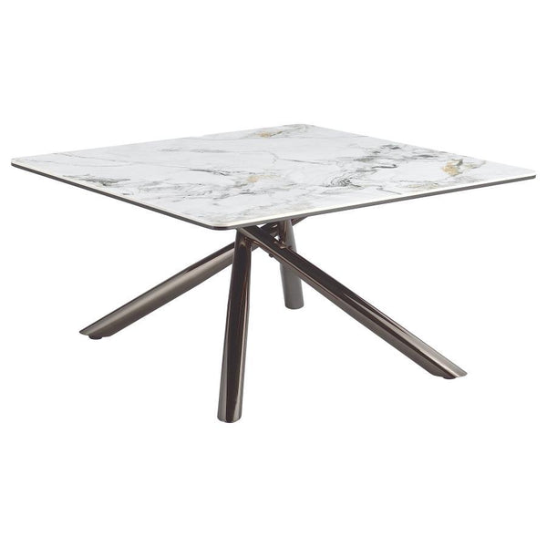 This sleek coffee table artfully balances luxurious textures and modern design. Its sintered stone top layer, set above black tempered glass, combines elegance and durability, while the steel asterisk base finished in black nickel electroplating adds a re
