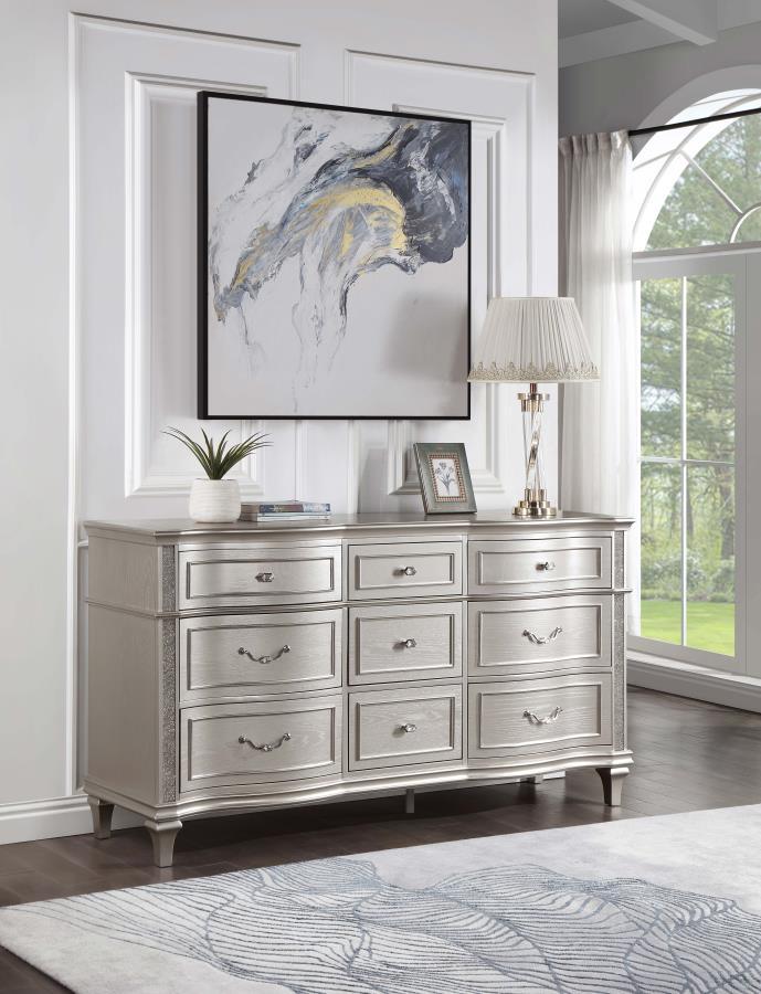 A silver oak finish creates an elegant touch to this glam nine-drawer dresser. Hexagon-shaped knobs and drop bail handles appointed with pearl accents adorn each of the nine spacious drawers for a luxurious look and feel. Keep delicate essentials organize