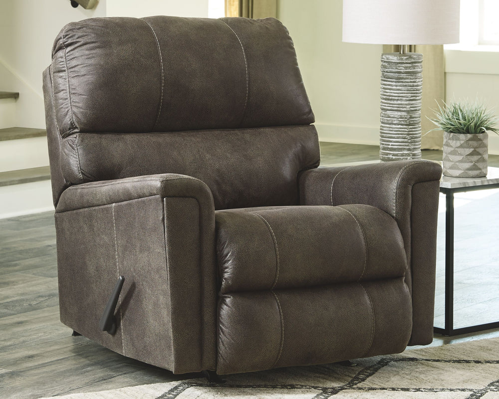If you love the cool look of leather but long for the warm feel of fabric, you can take comfort in this rocker recliner. Wrapped in a fabulous faux leather with a weathered hue and hint of pebbly texture to resemble the real deal, this decidedly modern re