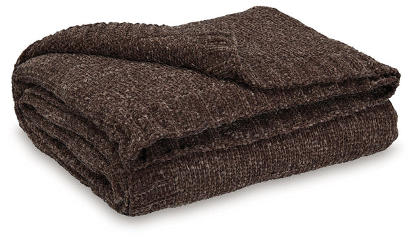 Comfort meets casually chic style in this throw blanket. Its neutral hue and knitted construction create trendy textural variation when draped over a sofa or the foot of a bed. And it goes beyond style, with the soft chenille fabric acting as a cozy compa