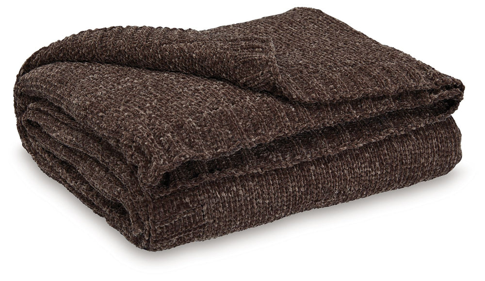 Comfort meets casually chic style in this throw blanket. Its neutral hue and knitted construction create trendy textural variation when draped over a sofa or the foot of a bed. And it goes beyond style, with the soft chenille fabric acting as a cozy compa
