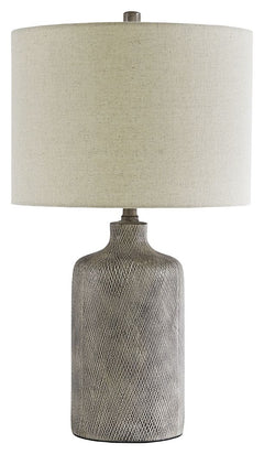 Brighten your bedside or illuminate your living space with this stylish table lamp. Understated ceramic base is finished with a striking antique black effect. Fabric drum shade is a soft touch and harbors light wonderfully.<br><br><b>Additional Dimensions