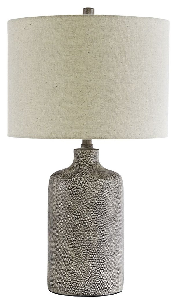 Brighten your bedside or illuminate your living space with this stylish table lamp. Understated ceramic base is finished with a striking antique black effect. Fabric drum shade is a soft touch and harbors light wonderfully.<br><br><b>Additional Dimensions
