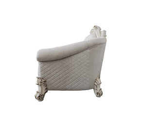  our new interpretation of Vendome II is donned. The Vendome II sofa-'s light gray fabric is grand and classy with crystal like button tufting on the back in a crackled gold p