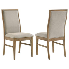 This dining chair combines a refined pearly almond finish with the comfort of warm wheat fabric upholstery. Crafted from Asian hardwood, engineered wood, and foam, the chair provides both durability and style. The ergonomic backrest offers excellent suppo