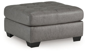 You want your living room to reflect your ultra-cool character. Introducing: this oversized accent ottoman. Its faux leather is a sleek and stylish approach to contemporary aesthetics. For a finishing touch, button tufting adds extra flair.<br><br><b>Addi