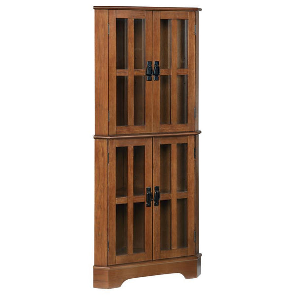 This accent cabinet is a magnificent addition to the home. It-'s designed to fit seamlessly in the corner of the living room or bedroom. It-'s crafted with four doors with window panels that has an enduring appeal. Each door opens to a space that-'s divid