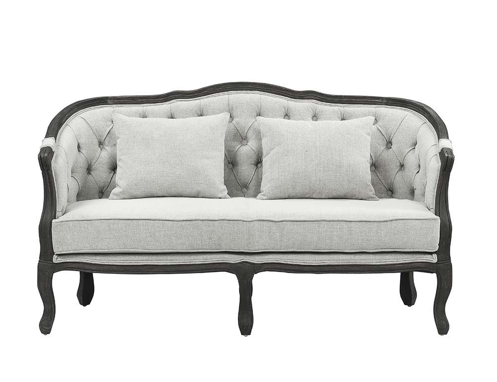 With a nod to vintage French design, the Samael is a modern interpretation of a camel-back sofa is distinguished by its exposed, and beautifully carved, wooden frame that wraps you in comfort. Its curved frame with a winding front rail sits off the floor 