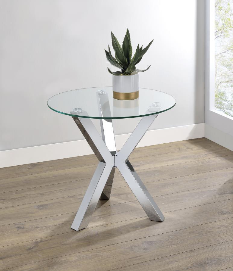 This sleek side table brings modern refinement to your living room, effortlessly doubling as an accent table, occasional table, or utility table. Its round tempered glass top rests elegantly on an electroplated chrome frame crafted from heavy gauge steel,