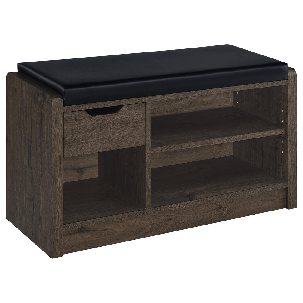 Make your entryway or garage both functional and stylish with this versatile storage bench, designed to keep your space organized. Featuring a foam cushion upholstered in sleek black faux leather, this bench offers a comfortable seat while you put on or t
