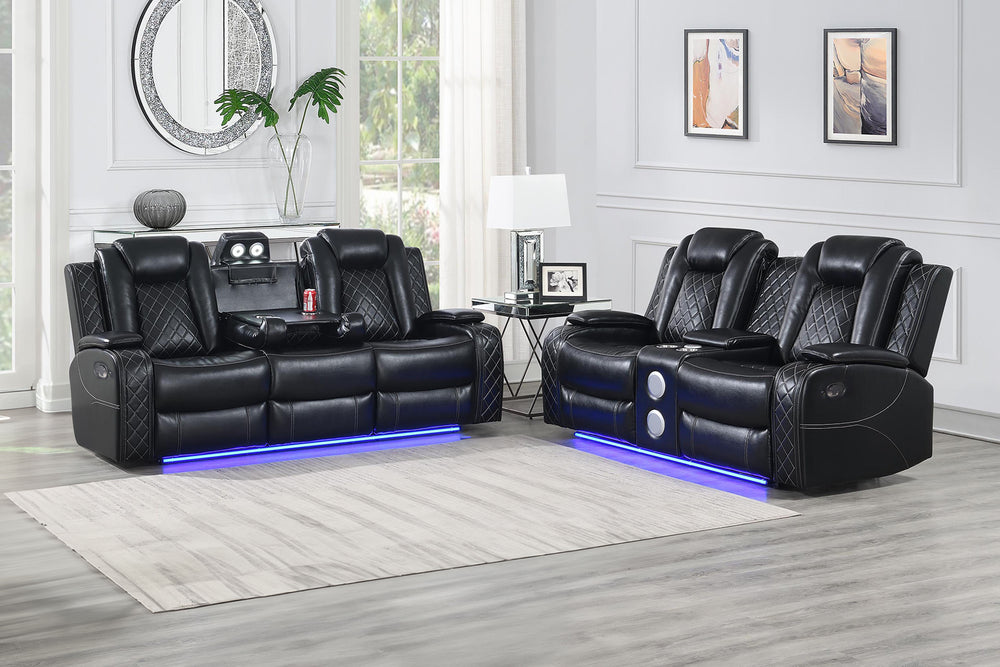 The Orion II 2-Piece Dual Reclining Sofa and Console Loveseat in Black offers both comfort and functionality. Crafted with a sturdy frame of hardwoods and manufactured wood, it promises durability and strength. The black upholstery, made of 80% polyester 