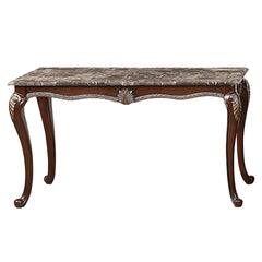 The Royal Classics Palazzo Marina Marble Top Sofa Table in Walnut is a stunning example of heirloom craftsmanship and timeless design. Expertly crafted from solid pine and enhanced with premium polyurethane carvings, this table offers both beauty and dura