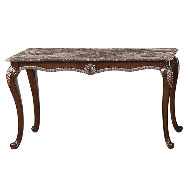 The Royal Classics Palazzo Marina Marble Top Sofa Table in Walnut is a stunning example of heirloom craftsmanship and timeless design. Expertly crafted from solid pine and enhanced with premium polyurethane carvings, this table offers both beauty and dura
