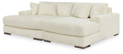 Plush and posh. Showcase your eye for on-trend texture with the statement-making cord upholstery of this double-chaise sectional. Its stunningly soft fabric entices in an ivory hue, complementing contemporary color palettes. Sink into the cushions and pla