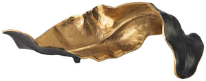 The -"missing piece-" for your stylish display. Unique and fun, this sculpture is one youâ€™ll want to snatch up quickly. The goldtone and black finish is simply striking.<br/><br/><b>Product Features</b><ul><li>Made of metal</li><li>Goldtone finish</li><