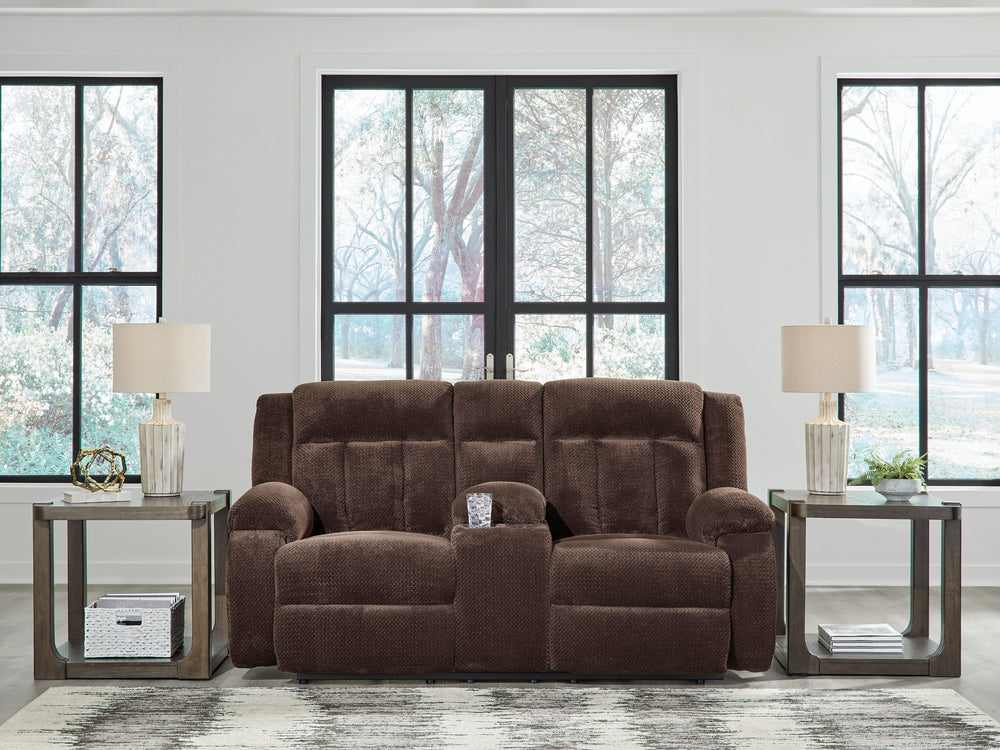 There-'s no need to sacrifice looks for comfortâ€”this power reclining loveseat with console serves up both, plus a richly relaxed sense of style. Its chocolate-hued velvet upholstery is ultra soft, with a plush waffle weave for an added layer of interest