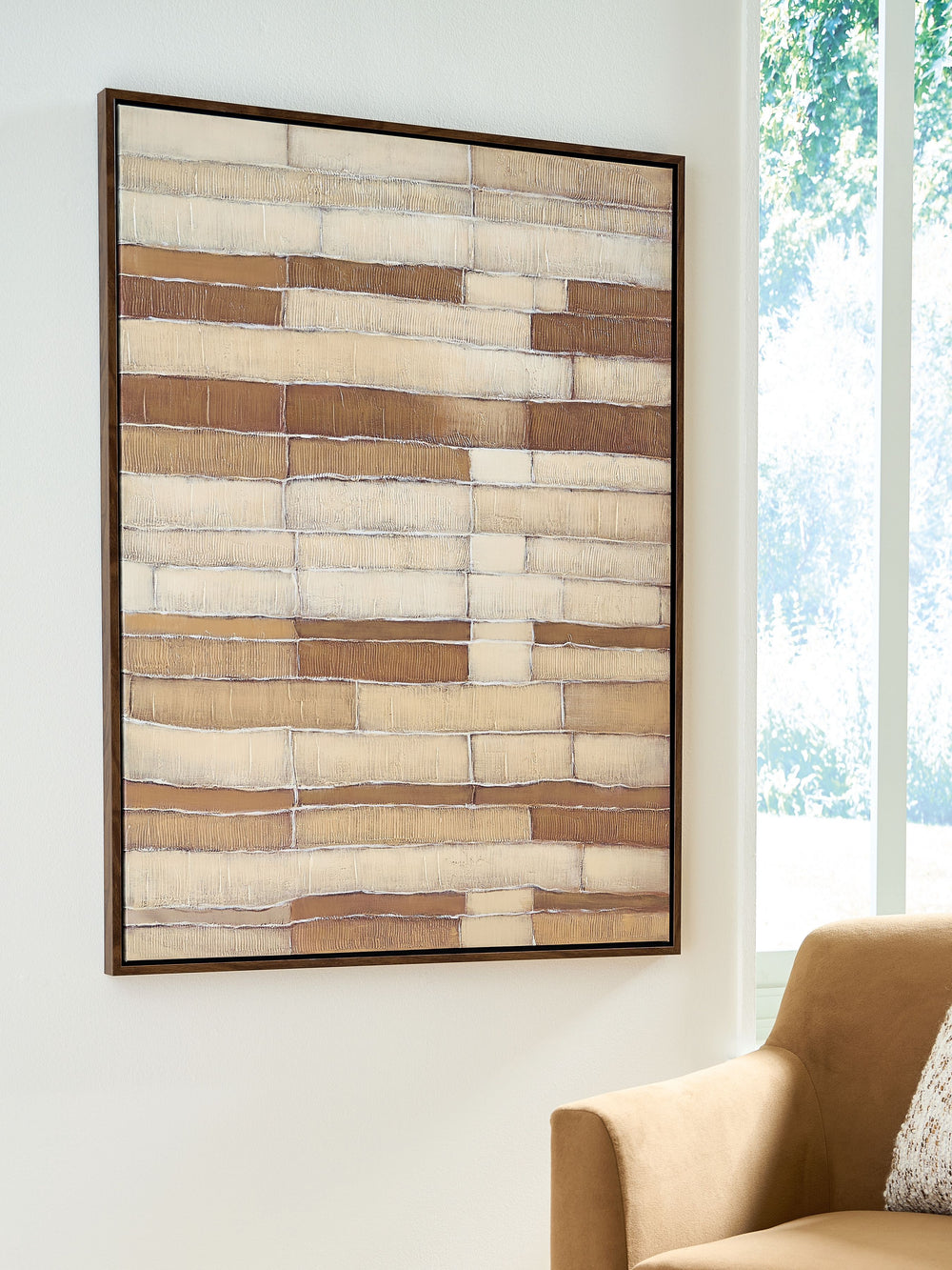 Putting a new twist on neutrals, this wall art grounds contemporary spaces with inspired style. An abstract grid design in brown, tan and white draws the eye while seamlessly pairing with existing decorative accents. Each piece is completed with hand-pain