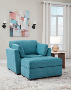 You want your home to reflect your modern, trendy eye for design. This seating package is here to help. Bold, bright and beautiful, it adds a fashion-forward pop of color to your living room. Velvet-like upholstery and matching bolster pillows keep comfor
