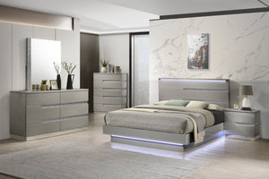 The Paradox Bedroom Collection is a stunning fusion of contemporary design and luxurious functionality. Its Gray gloss laminate water-resistant finish adds a sleek and modern touch while ensuring durability. The full extension drawer glides allow for effo