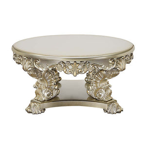 the Sorina coffee table is a great addition to your living room. The silver and gold finishes complement each other flawlessly. This coffee table showcases elaborate carvings on the table base to recreate 