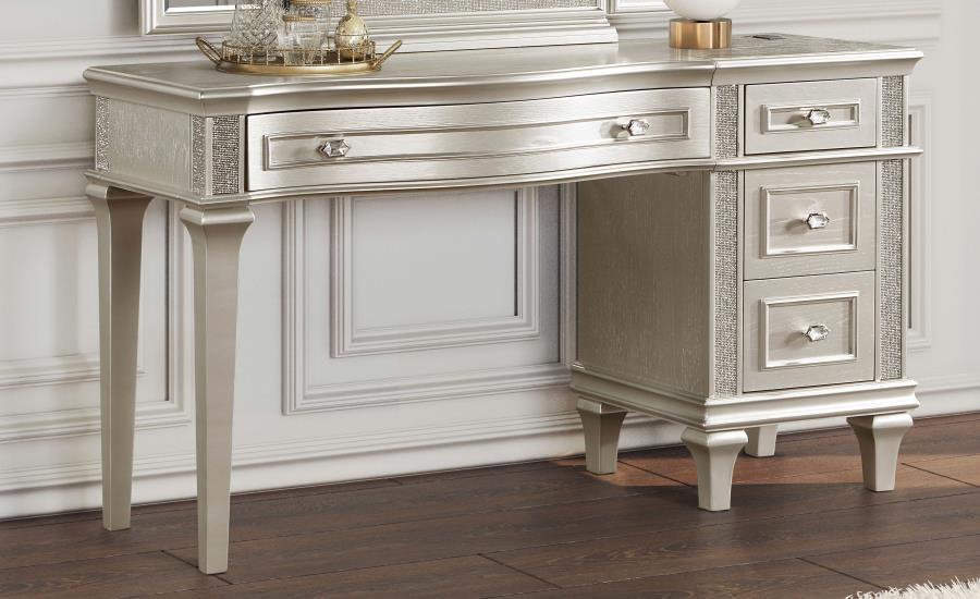 Infuse your bedroom with the sophisticated glamour of a gorgeous vanity desk. Delivering everything you need to get red-carpet ready, the vanity is equipped with four spacious drawers, including felt lining on top drawer, and a wide top to spread out all 