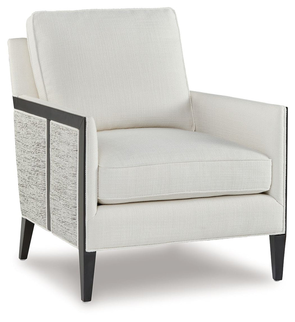 This accent chair completes your lounge area in chic, contemporary style. Itâ€™s a fashion-forward take on geometric patterns, with the exterior fabric in varying neutral hues contrasting the ivory seat. With this chair, your trendy interior is upgraded w