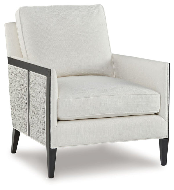 This accent chair completes your lounge area in chic, contemporary style. Itâ€™s a fashion-forward take on geometric patterns, with the exterior fabric in varying neutral hues contrasting the ivory seat. With this chair, your trendy interior is upgraded w