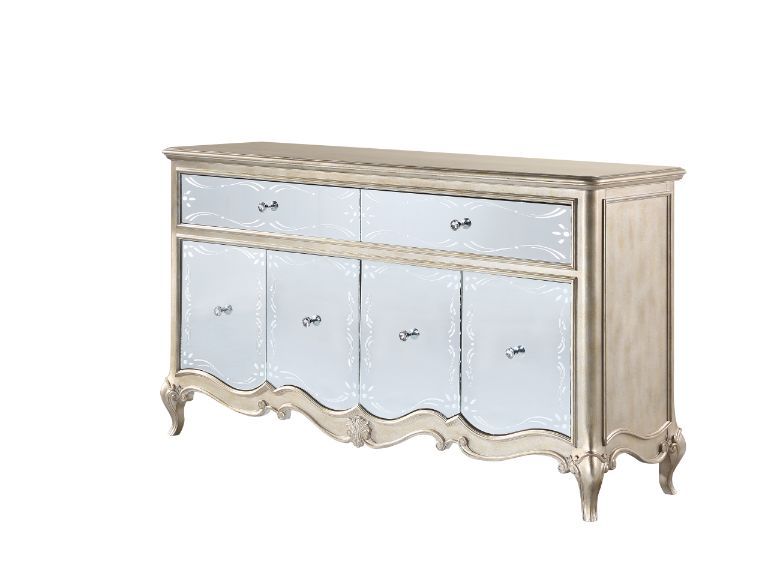 Every piece in the Esteban dining collection reflects vintage glam style! Gorgeous details such as raised scroll trim and crystal handles with mirrored fronts on the case pieces transform the entire collection into something extraordinary. The antique cha