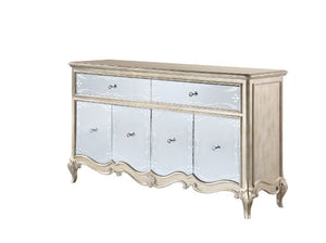 Every piece in the Esteban dining collection reflects vintage glam style! Gorgeous details such as raised scroll trim and crystal handles with mirrored fronts on the case pieces transform the entire collection into something extraordinary. The antique cha