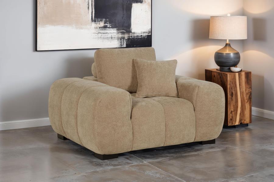 Transform your reading nook or living area into a haven of comfort with this mid-century inspired chair. Its wide, rounded arms and plush, tufted waterfall seat invite you to relax, while soft, neutral upholstery enhances its cozy appeal. A durable frame 