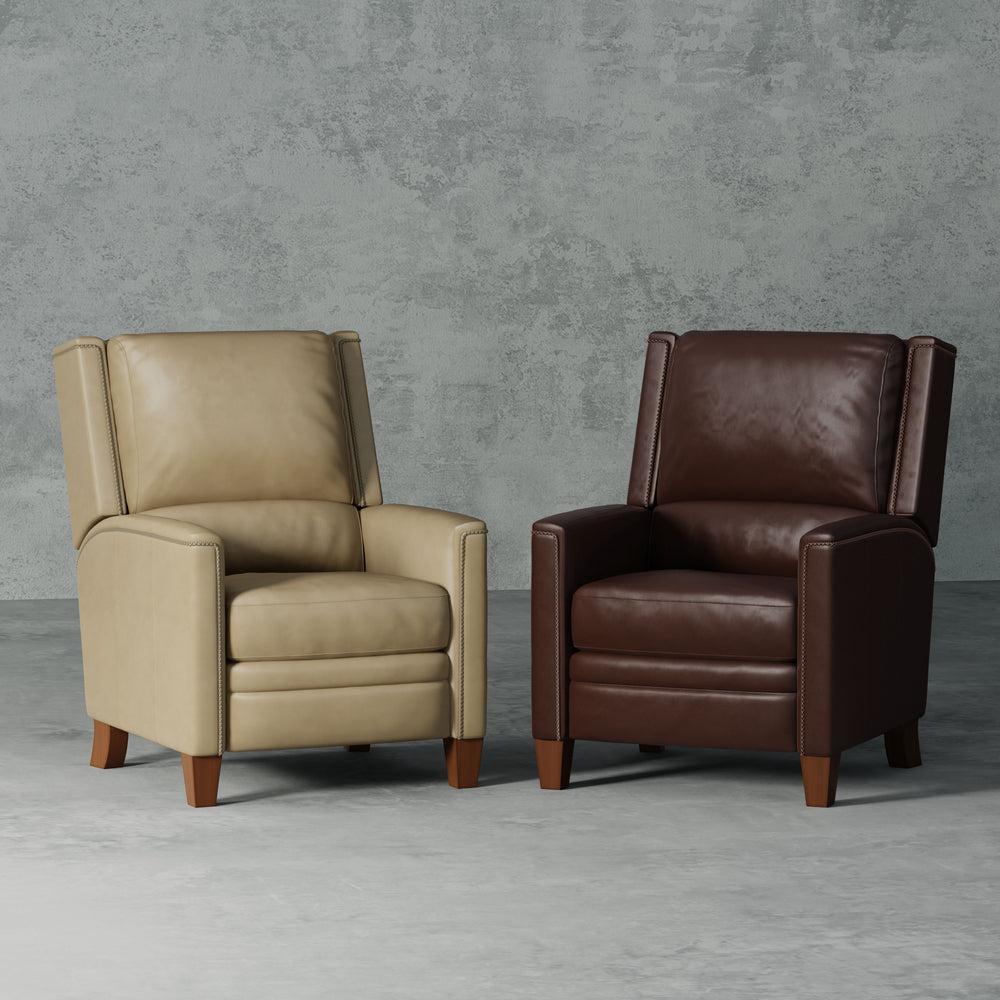 The Connor recliner boasts an effortless manual pushback recline for seamless relaxation. Upholstered in the finest soft leather with a custom match, it exudes sophistication. The decorative twisted rope stitching detail adds a touch of elegance, while th
