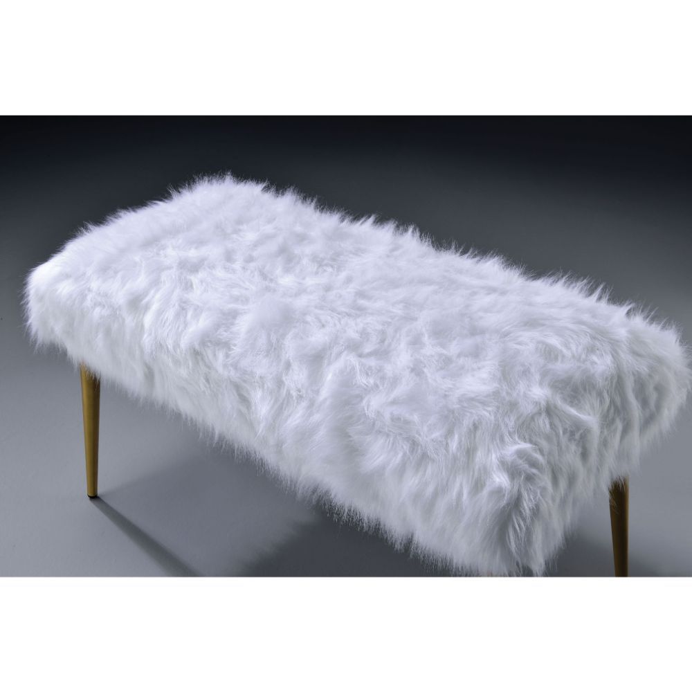 Exude an air of sophistication and comfort with this Bagley II bench. Featuring white faux fur seat cushion and gold metal base, this armless lounge bench is destined to be your favorite piece. Regardless where you placed it, it will always be the attenti