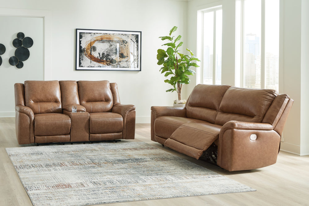 This power reclining set delivers comfort and contemporary style in a big (but not bulky) way. Its supple leather and faux leather upholstery, sumptuous cushioning and one-touch control are sure to take you to your happy place. The sofa-'s power adjustabl