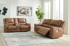 This power reclining set delivers comfort and contemporary style in a big (but not bulky) way. Its supple leather and faux leather upholstery, sumptuous cushioning and one-touch control are sure to take you to your happy place. The sofa-'s power adjustabl