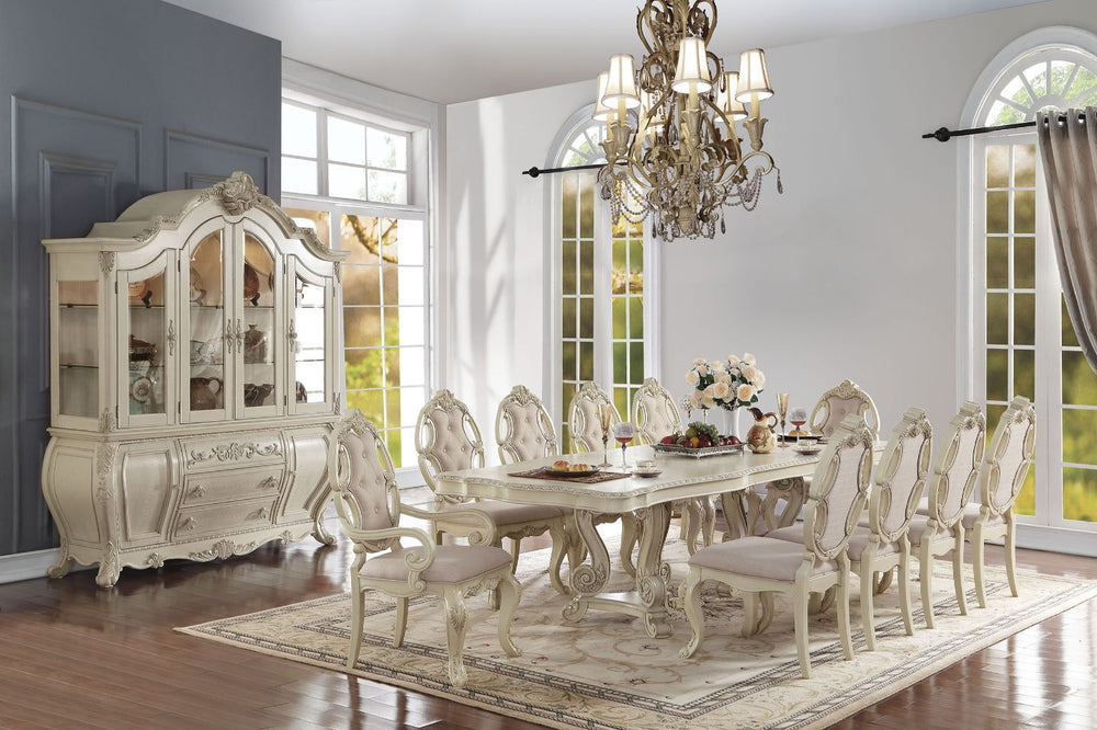 The Ragenardus formal dining collection shows traditional style that is designed to impress. Each piece of this collection demonstrates delicate craftsmanship and intricate carved details. Matching hutch and buffet reflect all carefully selected design th