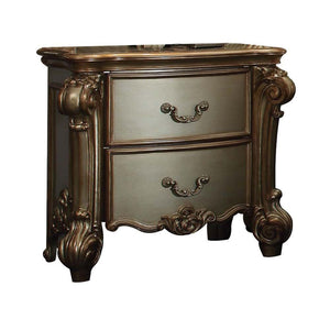 Create an elegant, traditional design in your bedroom with the Gold Patina and bone Vendome nightstand. This hand-crafted piece inspired from the luxurious designs of the past, this two-drawer nightstand features elaborate wood carving details, traditiona