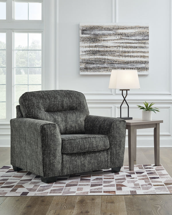  the plush upholstery and dark tri-block legs are a natural complement for so many color schemes. Curling up with a good boo
