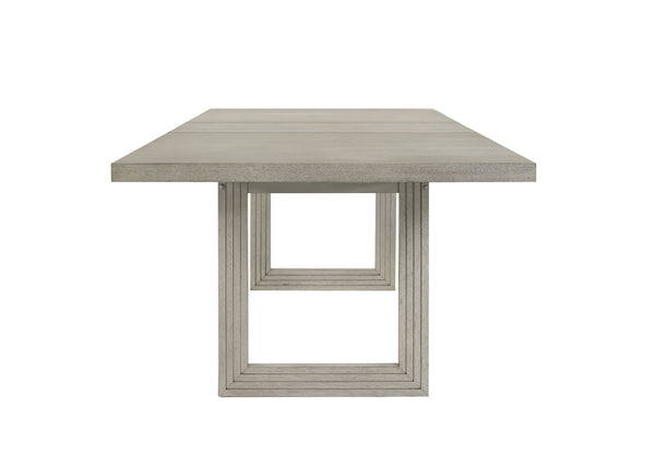  natural finish that highlights the woodgrain detail. Accompanied by sleek chairs upholstered in a plush