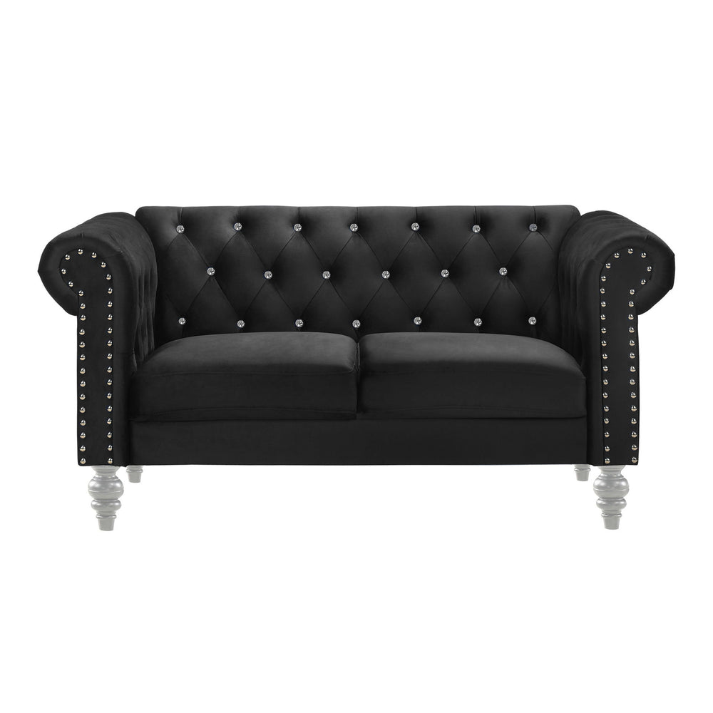 The New Classic Emma Chesterfield Velvet 2 Seat Sofa Loveseat is a blend of soft elegance and sophisticated design. Crafted from 100% polyester velvet fabric, it offers cozy and indulgent seating for two. The glam tailoring features tufted backs and arms 