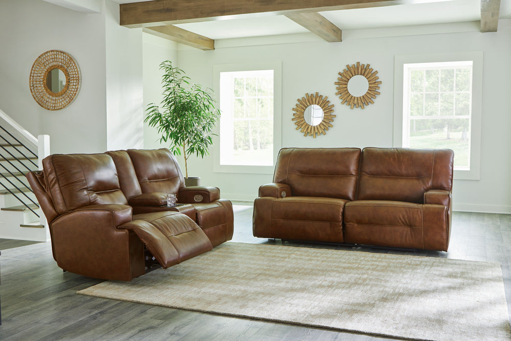 Master statement-making contemporary comfort with this power reclining sofa and loveseat. It displays a striking yet streamlined profile, with auburn-hued leather in the spacious seating area balancing natural beauty and refined design. Adjustable headres