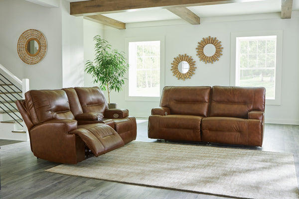 Master statement-making contemporary comfort with this power reclining sofa and loveseat. It displays a striking yet streamlined profile, with auburn-hued leather in the spacious seating area balancing natural beauty and refined design. Adjustable headres