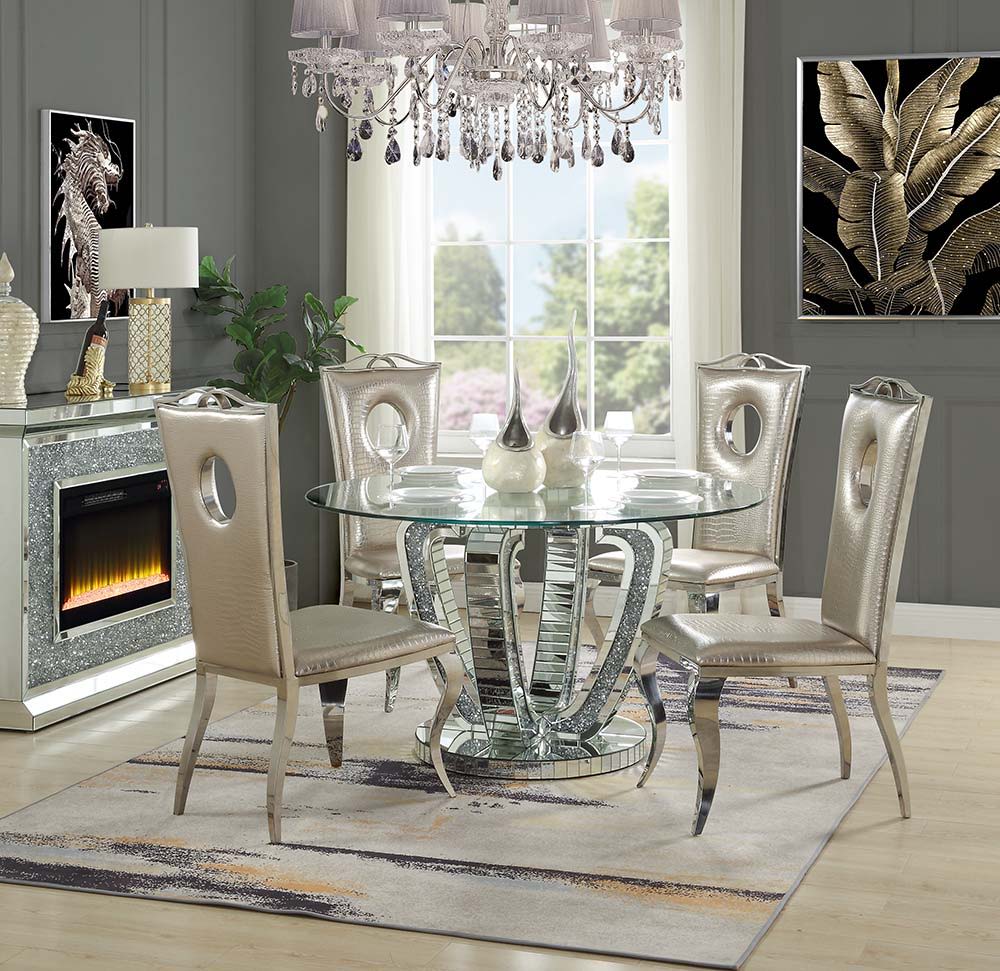 Place this gorgeous Ningbo dining table in any modern setting. The mirrored base durably supports the round clear glass top, which allows the beautiful curves to be highlighted. The panel mirrored base features inlaid faux diamonds that both reflect light