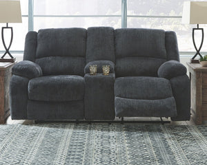  this reclining loveseat with center console lets you kick back in reliable style. The thick