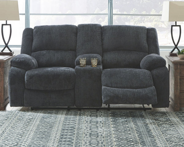  this reclining loveseat with center console lets you kick back in reliable style. The thick