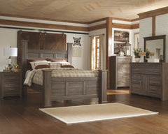 Vintage aged brown rough sawn finish over replicated oak grain. Large scaled rustic bedroom collection features case pilasters and thick poster bed posts. Substantial warm pewter color drawer handles. Poster bed offers optional footboard storage. Side rol