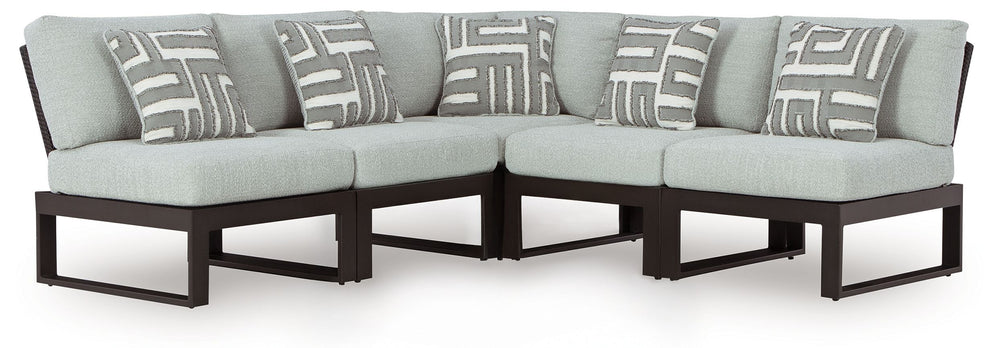 Sleek, contemporary style meets outdoor living in this sectional. Its clean-lined black aluminum frame and resin wicker back expertly balance good looks and longevity. The enhanced UV resistance of Nuvella+â„¢ fabric keeps the cushions light and bright, w