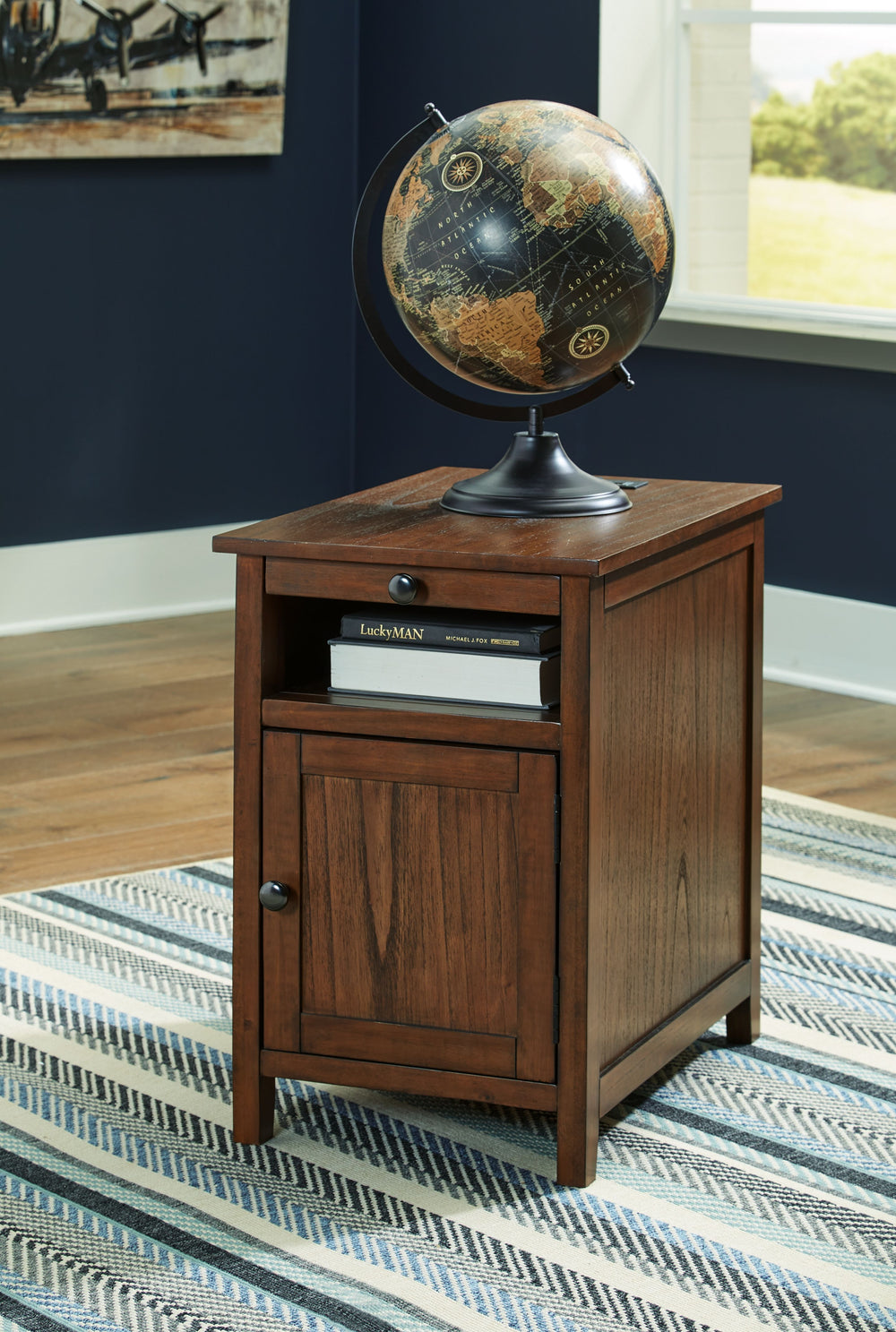 Add big character to a small space with this chairside end table. With its compact size and strong silhouette, it can go anywhere and blend easily into the decor. Less is so much more with the Shaker-inspired design and warm brown wood tone finish. Loaded